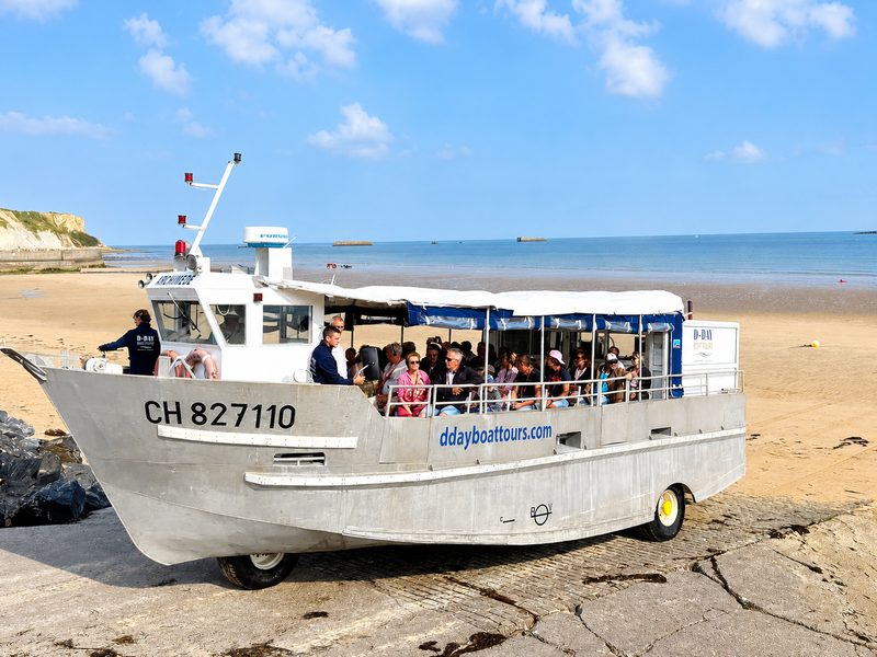 The Archimède on the Neptune slipway in Arromanches, passengers on board.