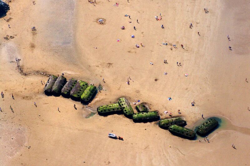 Close-up of a Phoenix caisson on the beach at Arromanches-les-Bains.
